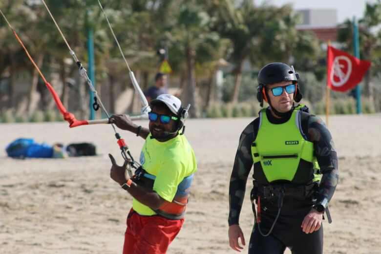 Group kitesurfing lesson with students and instructor